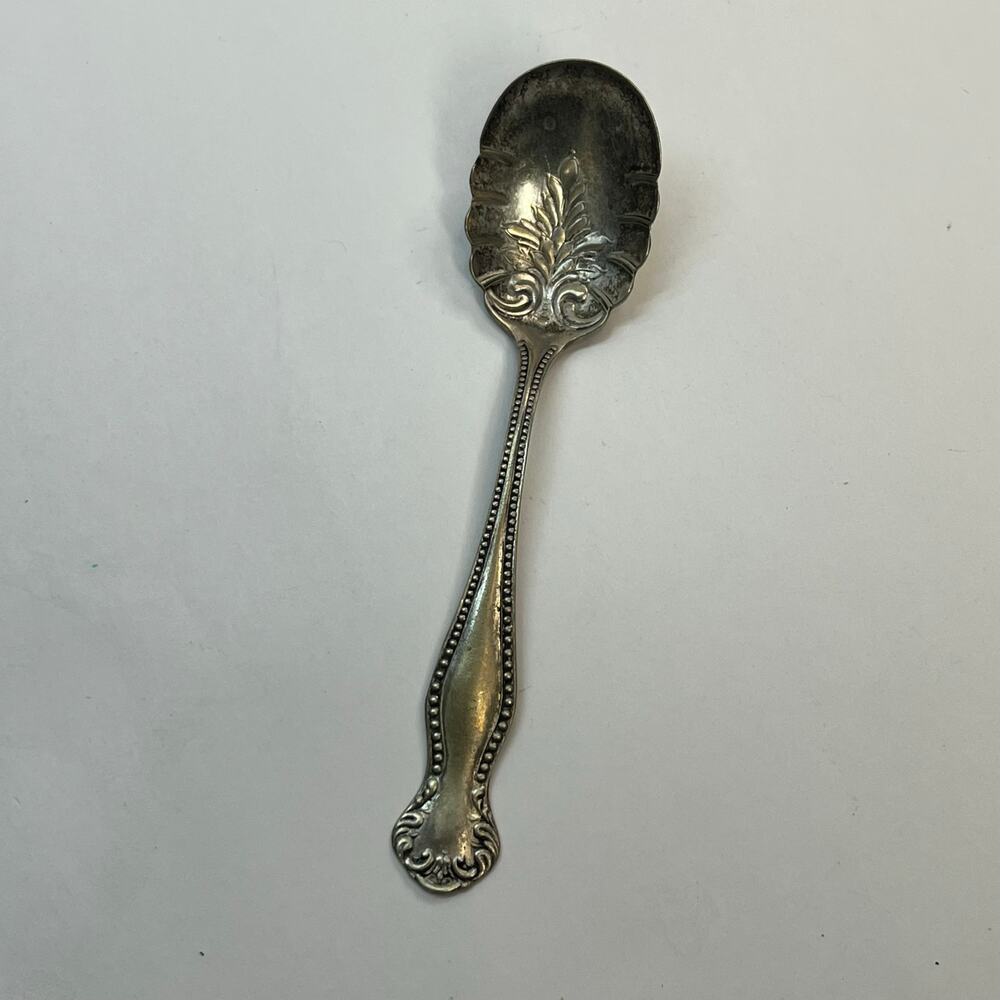 Ornate silver plate sugar shell spoon w in diamond hallmark vintage 6 inch‎